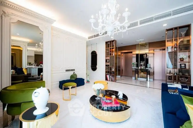 Luxurious living room with elegant chandelier and modern decor