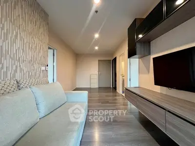 Modern living room with sleek design and stylish furniture in a contemporary apartment.