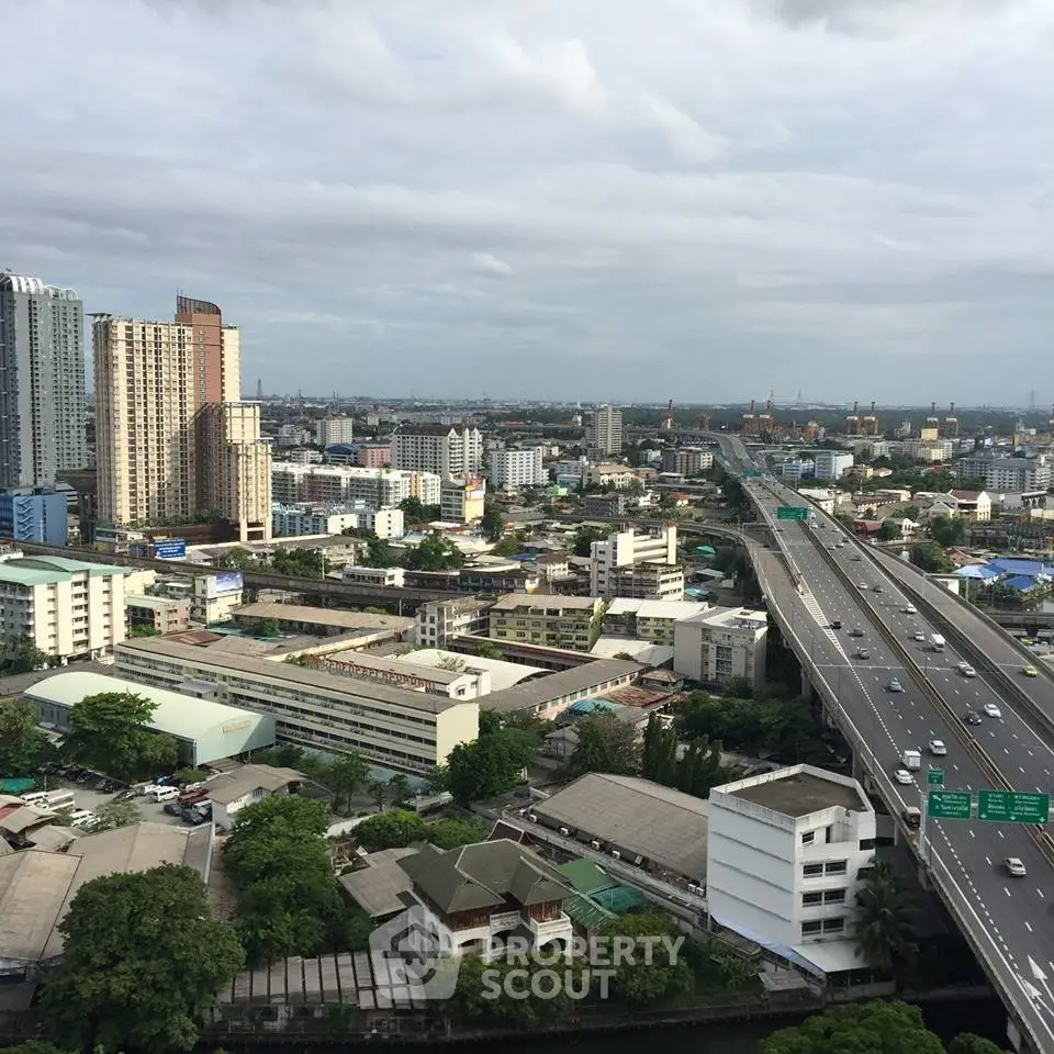 Stunning cityscape view showcasing urban skyline and highway connectivity.