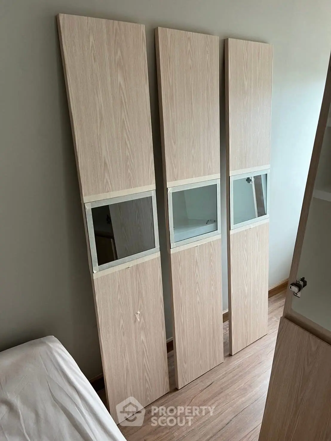 Modern interior with wooden panels and mirrors, perfect for stylish home decor.