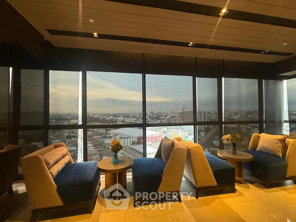 Luxurious high-rise lounge with panoramic city views and elegant seating.
