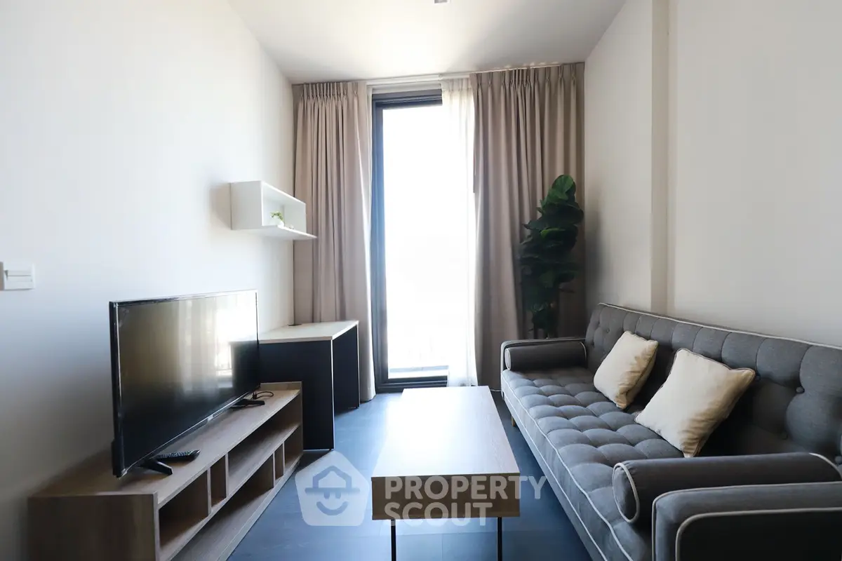 Modern living room with sleek furniture and natural light