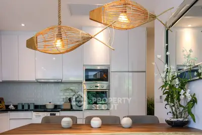Modern kitchen with stylish lighting and sleek appliances