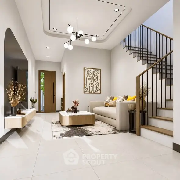 Modern living room with elegant staircase and stylish decor in a contemporary home.