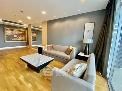 Spacious modern living room with elegant decor and hardwood floors