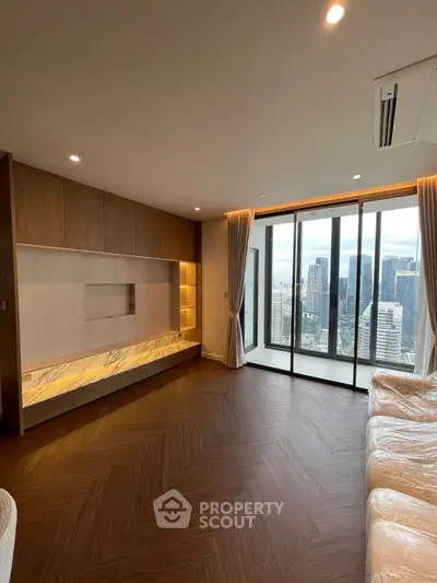 Luxurious living room with stunning city view and elegant wooden flooring