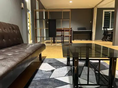 Modern living room with stylish furniture and open layout, perfect for contemporary living.