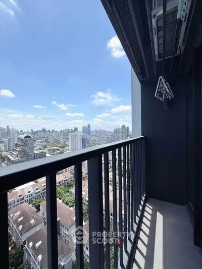 Stunning cityscape view from a modern high-rise balcony, perfect for urban living enthusiasts.
