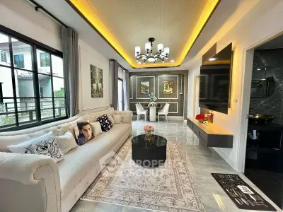 Luxurious living room with elegant decor and modern lighting