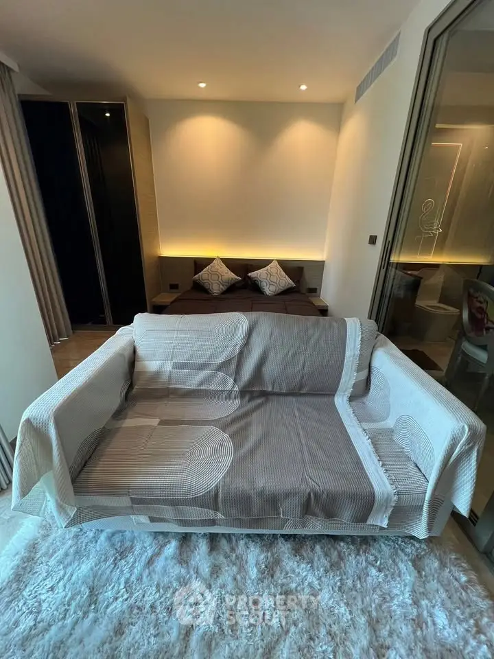 Modern studio apartment with cozy sofa and stylish decor