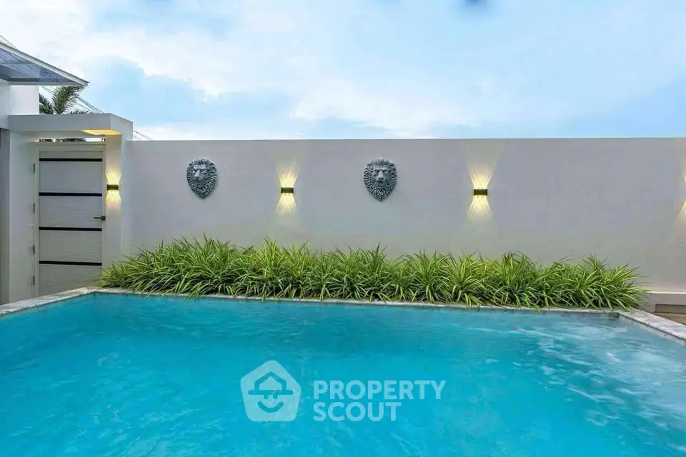 Luxurious private pool with modern design and ambient lighting, perfect for relaxation and entertainment.