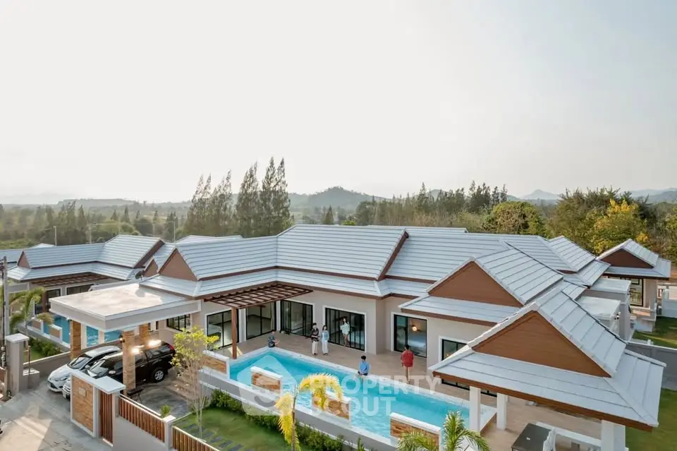 Luxurious modern villa with private pool and stunning mountain views, perfect for serene living.
