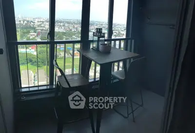 Charming balcony with city view, perfect for relaxing and enjoying the skyline.