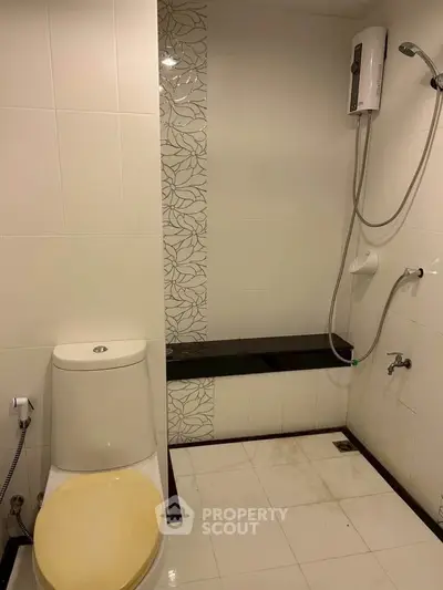 Modern bathroom with shower and toilet in minimalist design