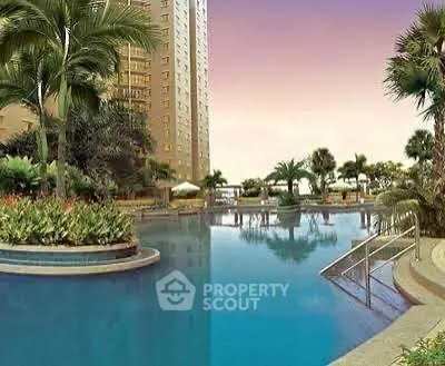 Luxurious residential pool area with lush landscaping and modern design.