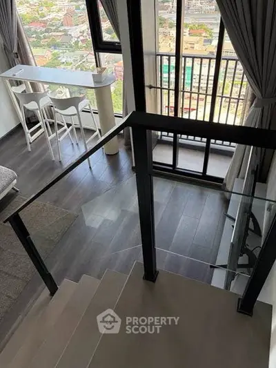 Modern duplex apartment with stunning city view and stylish interior design