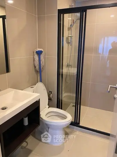 Modern bathroom with sleek shower and contemporary fixtures