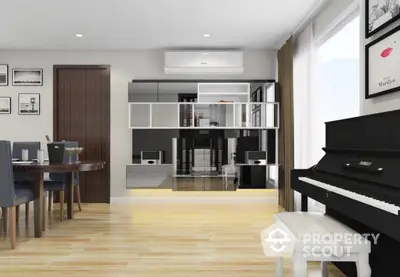 Elegant open-plan living space with polished hardwood floors, modern kitchen, and a grand piano, perfect for entertaining and relaxation.