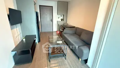 Modern living room with sleek furniture and minimalist design, perfect for urban living.