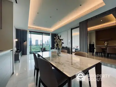 Luxurious open-plan dining area with city view and modern decor