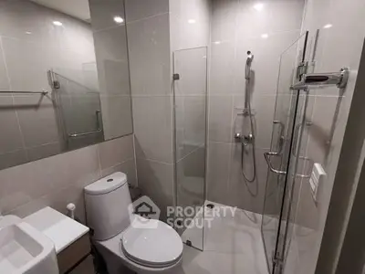 Modern bathroom with sleek shower and contemporary fixtures