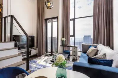 Luxurious modern living room with high ceilings and city view