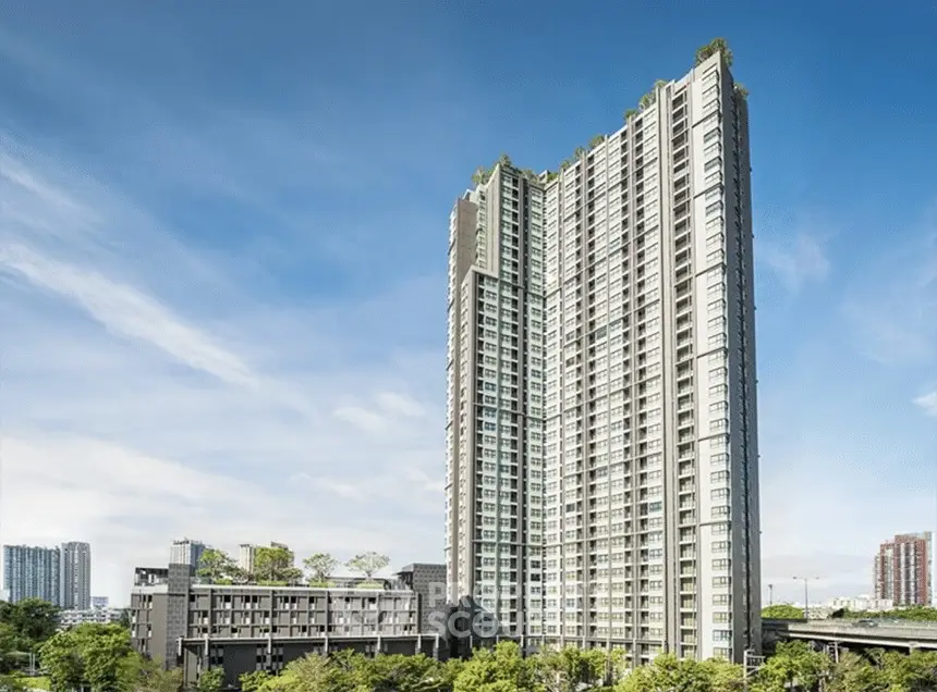 Stunning high-rise building with lush greenery and panoramic city views, perfect for urban living.