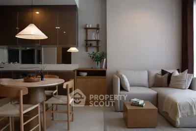 Modern living room with cozy sofa and dining area in stylish apartment