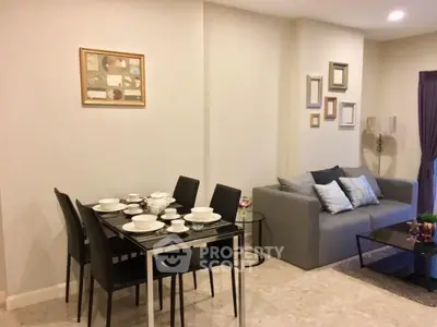 Modern living room with elegant dining area and cozy sofa setup
