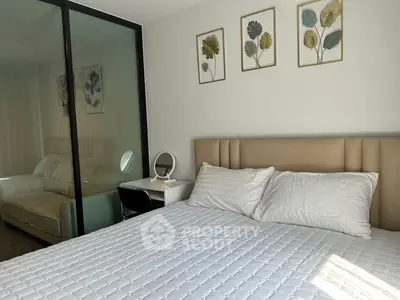 Modern bedroom with stylish decor and comfortable bedding