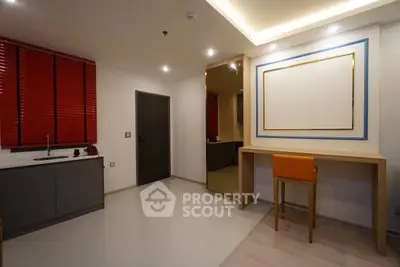 Modern interior with sleek kitchen and stylish bar seating