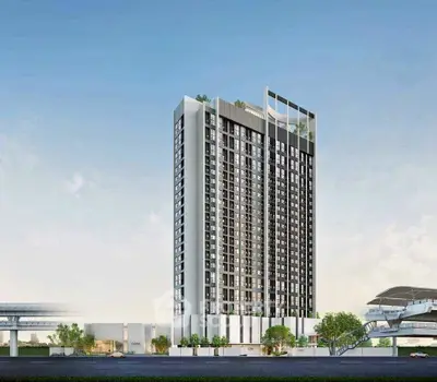Modern high-rise building with sleek design and urban surroundings, perfect for city living.