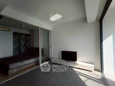 Modern living room with sliding glass doors and natural light