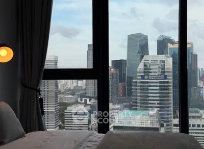 Luxurious bedroom with stunning city skyline view from large windows, perfect for urban living.
