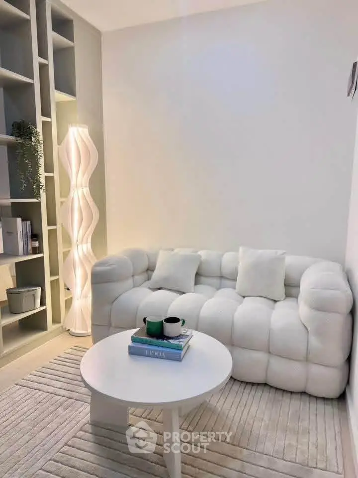 Chic modern living room with plush white sofa and stylish decor