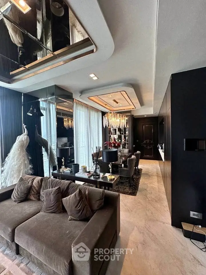 Luxurious living room with elegant decor and floor-to-ceiling windows