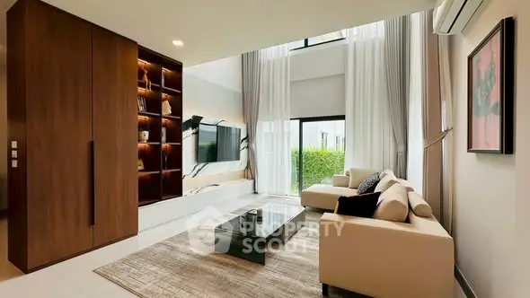 Luxurious modern living room with high ceilings and elegant decor