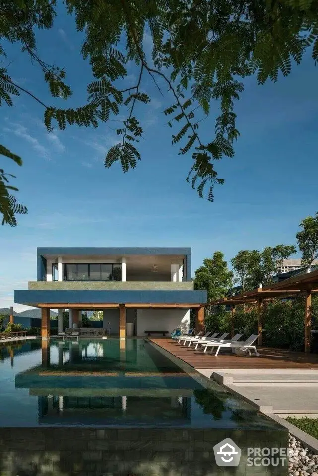 Luxurious modern villa with stunning pool and lush greenery