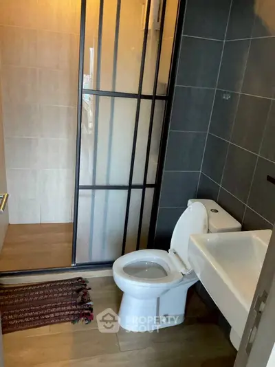 Modern bathroom with sleek design and glass shower partition