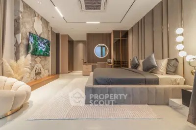 Luxurious modern bedroom with elegant decor and ambient lighting