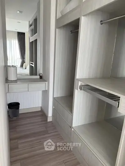 Spacious walk-in closet with modern design and ample storage space