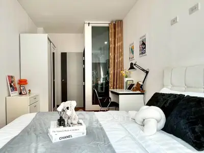 Chic modern bedroom with stylish decor and cozy ambiance