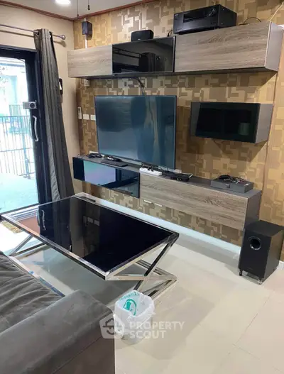 Modern living room with sleek entertainment center and stylish decor