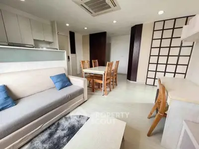 Modern living room with stylish furniture and open layout in a bright apartment.
