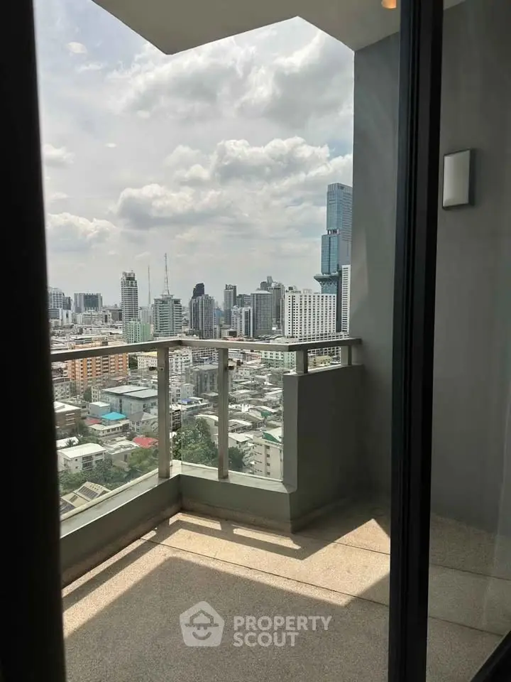 Stunning cityscape view from a modern high-rise balcony, perfect for urban living enthusiasts.
