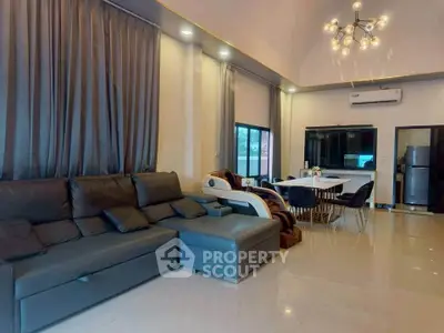 Spacious modern living room with elegant lighting and stylish furniture