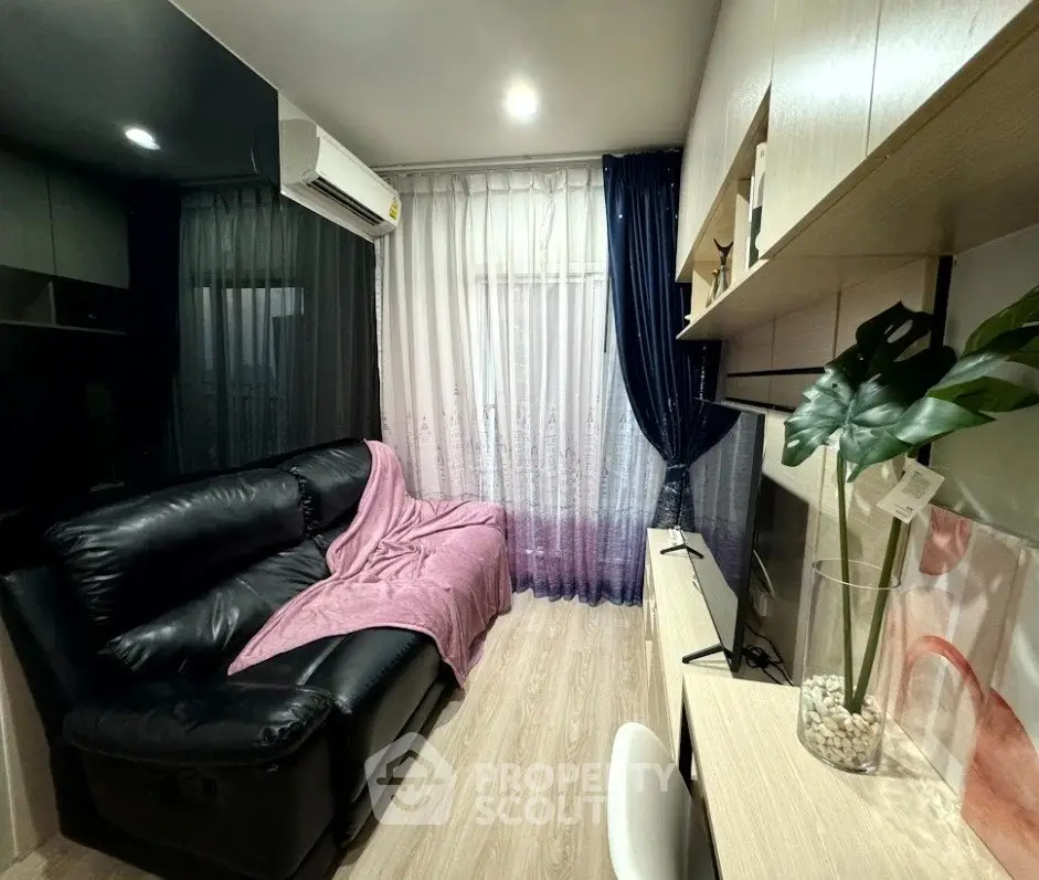 Cozy living room with modern decor and comfortable seating