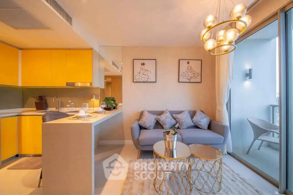 Modern living room with vibrant yellow kitchen, cozy seating, and elegant lighting in a stylish apartment.