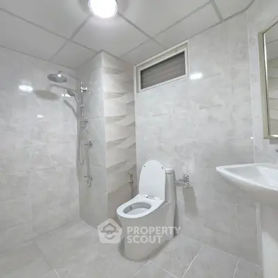 Modern bathroom with sleek fixtures and elegant tile design