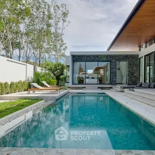 Luxurious modern home with stunning pool and sleek architecture.